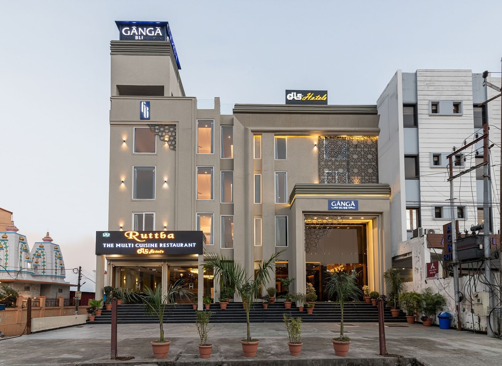 A facade image shot from the front of DLS Ganga Bliss, Haridwar with a clear sky in the background
